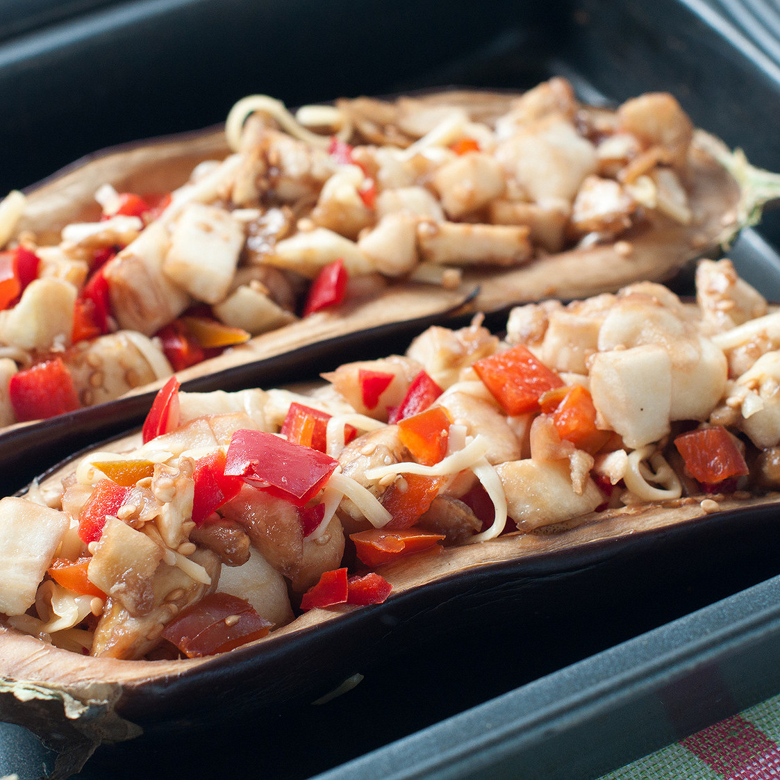 Aubergines farcies aux champignons et poulet